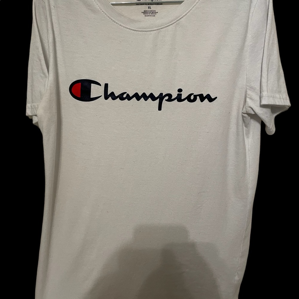 Champion T size XL in youth which is a woman’s XS